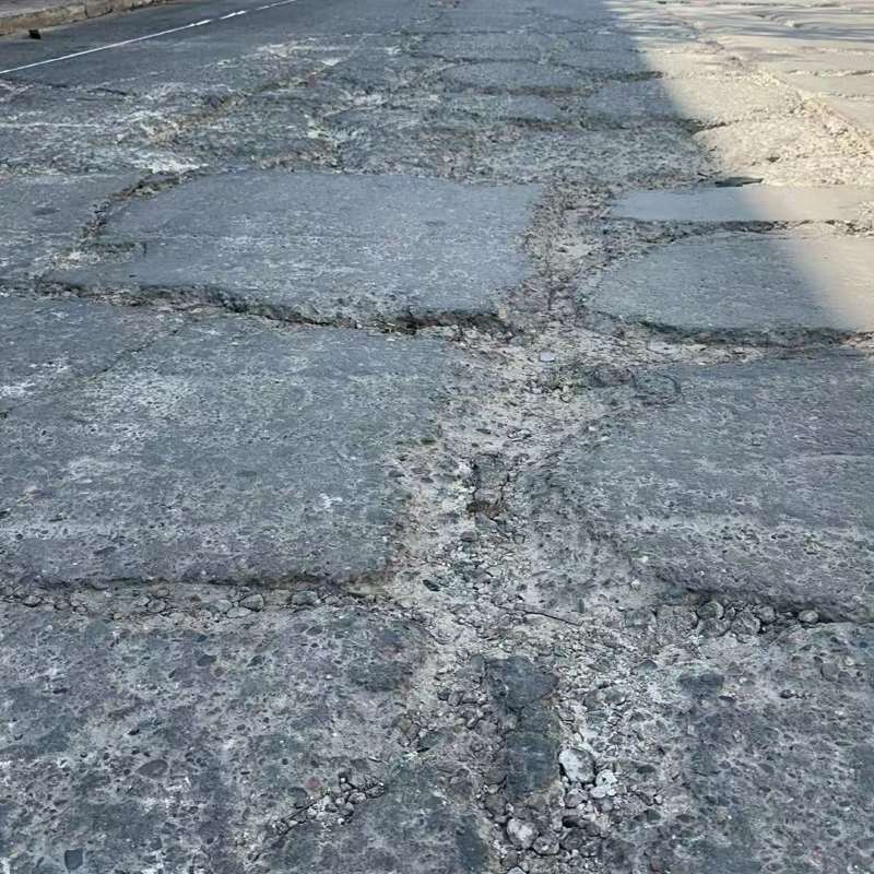 下陆路面起砂露石子修补料